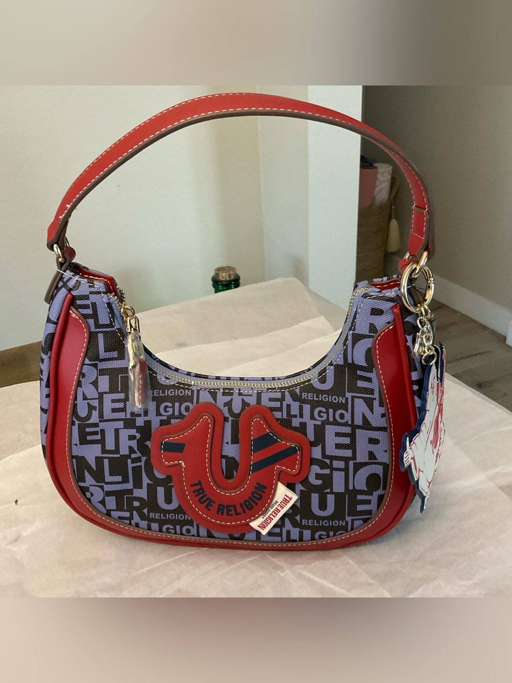 True Religion Blue/Red Logo Crescent Shoulder Boho Bag with Buddha Charm